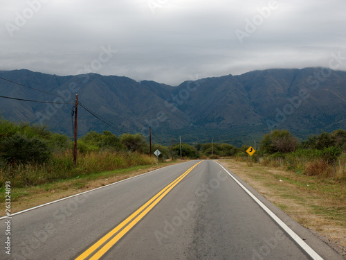 A road near Villa de Merlo, San Luis, Argentina, with the Comechingones mountains in the background.