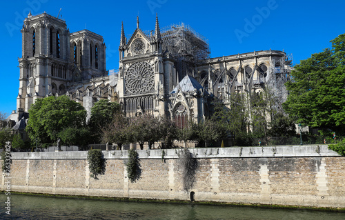The view of Notre Dame cathedral without roof and spire destroyed by the fire , Paris.