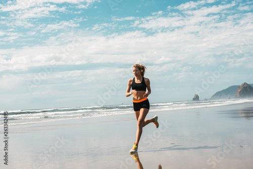 Woman working out on beach