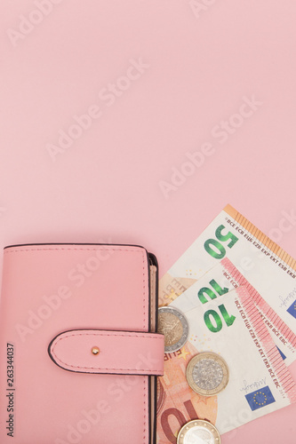 Wallet with Euro Currency on a Vibrant Blue Background. Business Concept and Instagram