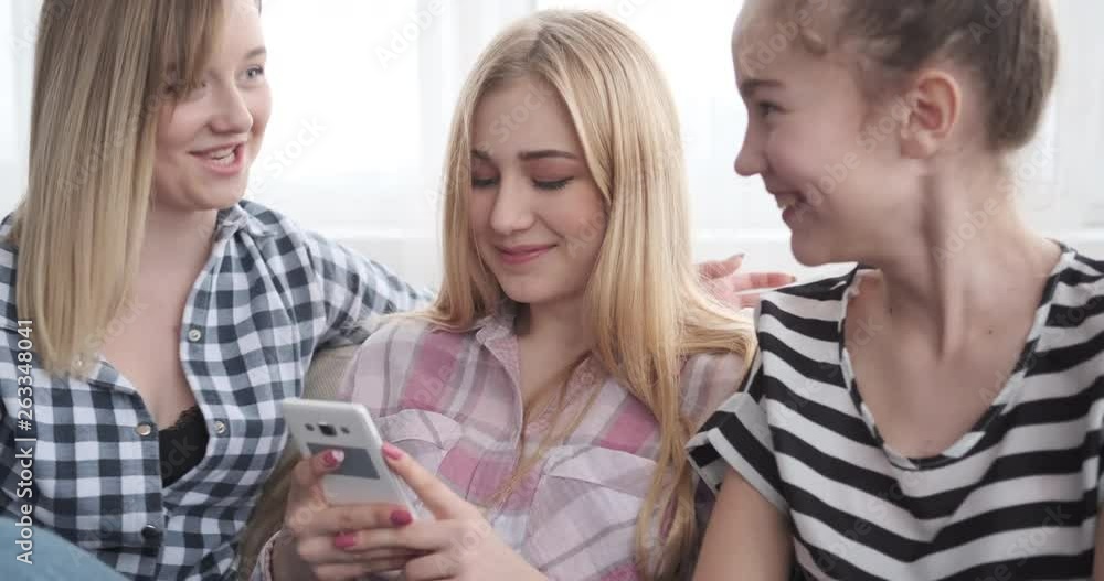 Teenage girls watching media content and dancing Teenage girls watching media content and dancing