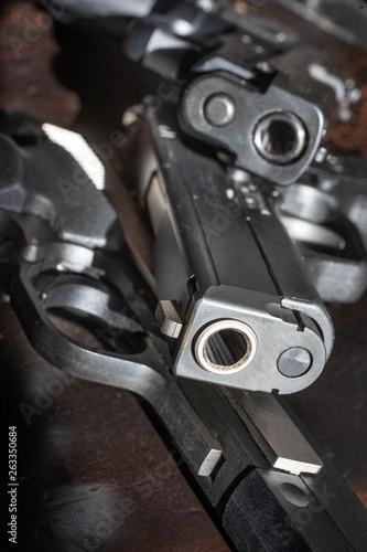 3 pistols piled together © tonywoodphoto