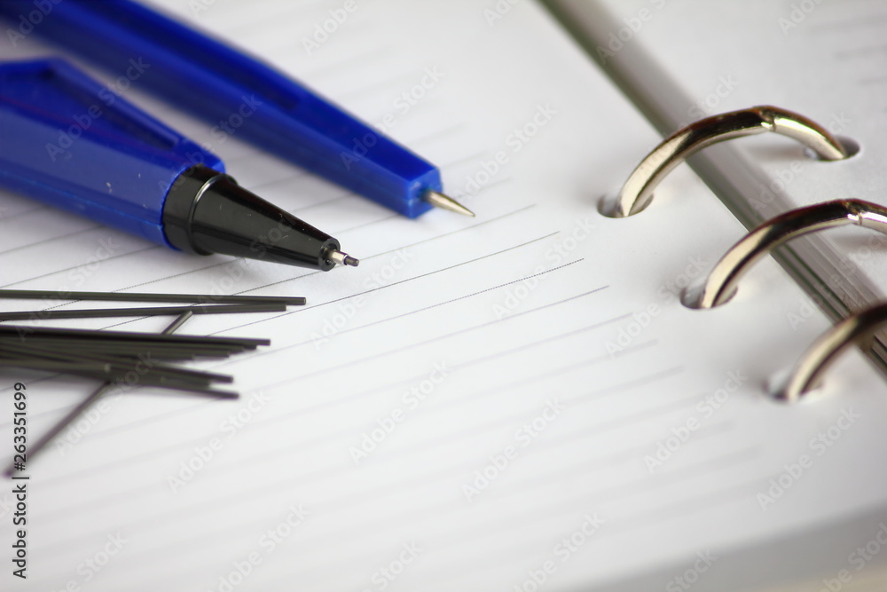 pencil and close up blank pages with lines of open notebook diary pencil and close up blank pages with lines of open notebook diary