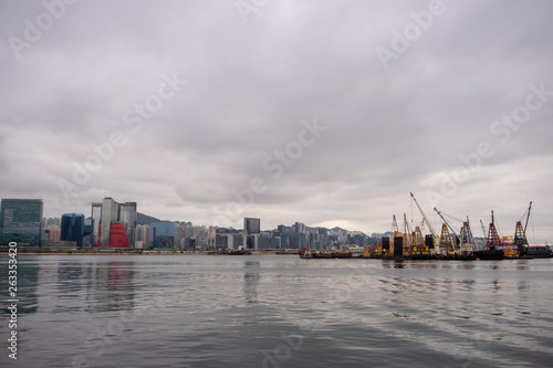 Panorama view of river  business district and crane boat on cloudy sky background and copy space