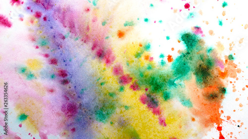 Abstract watercolor hand painting background. Spray and gradient transitions. Crimson, purple, yellow, green and orange colors.