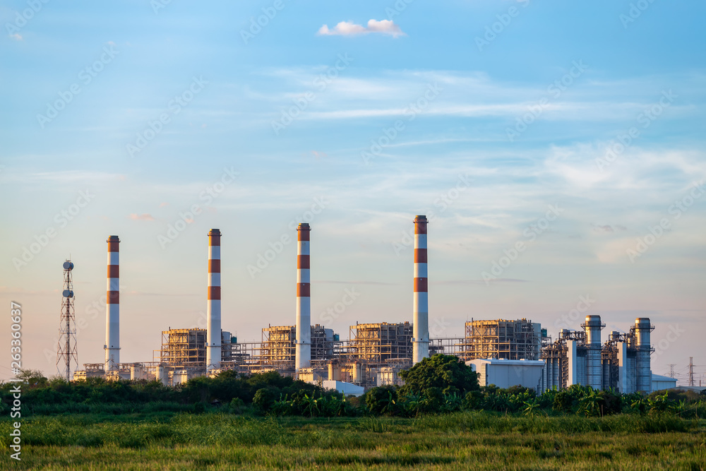 Gas turbine electrical power plant with sunset Gas turbine electrical power plant with sunset