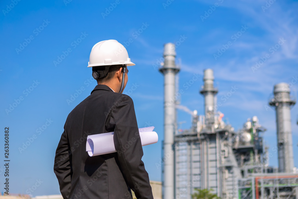 Engineer is checking plant around Gas turbine electrical power plant Engineer is checking plant around Gas turbine electrical power plant