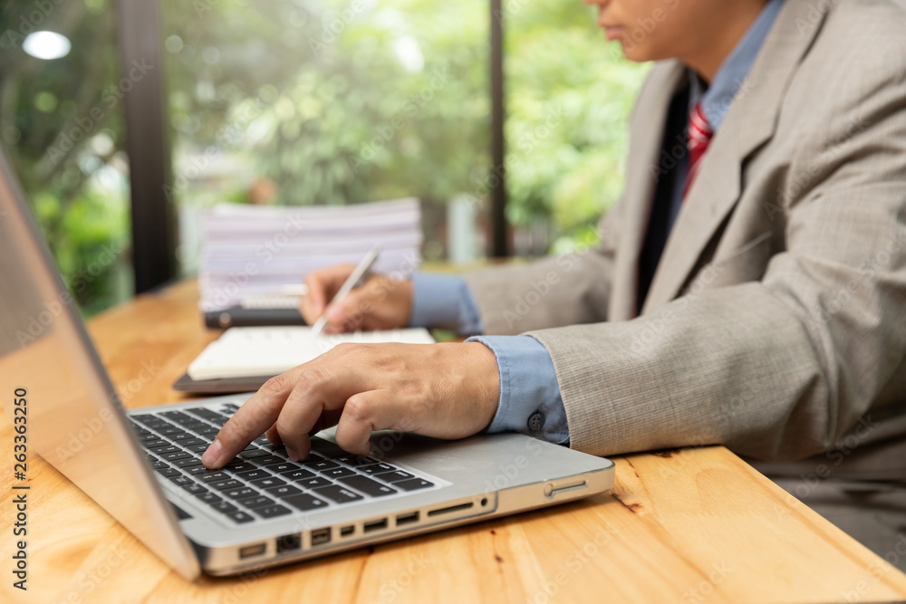 Business and finance concept of office working,Teamwork of Businessmen discussing investment business plan in office Business and finance concept of office working,Teamwork of Businessmen discussing investment business plan in office