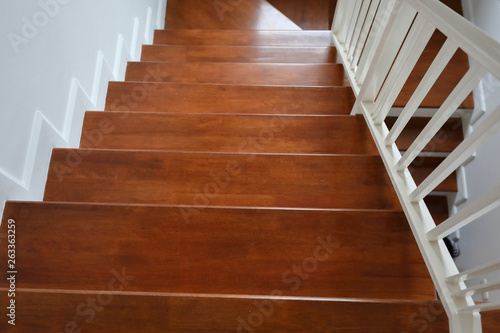 brown wooden stair interior decorated modern style of residential house