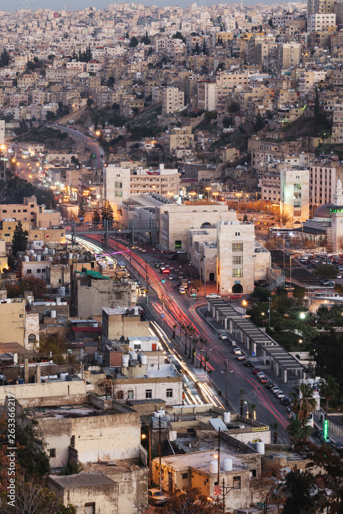 Cityscape of Amman capital city in Jordan, Middle East in evening