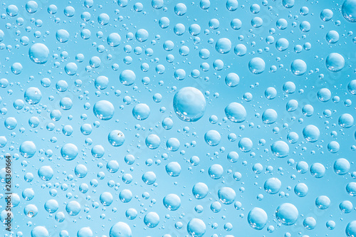 Close up picture of water drops on glass background