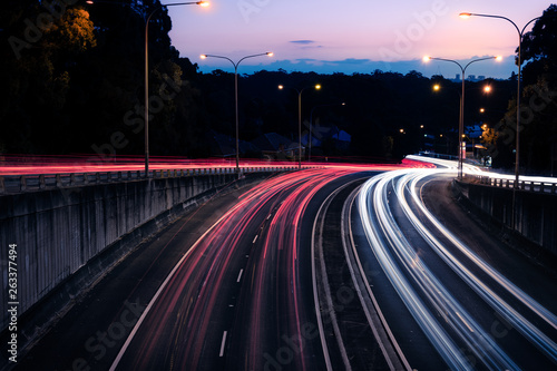 Traffic light trails at dusk down Ryde Road, seen from the Pacific Highway Bridge at Pymble.