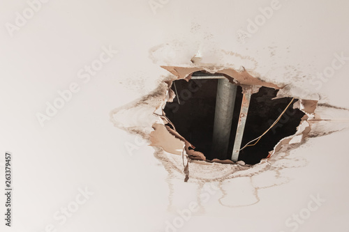 gypsum ceiling decay hole interior office building