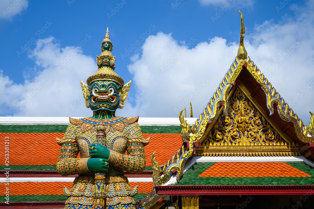 Giant statue in Wat Phra Keaw, Royal Grand Palace in Bangkok Thailand.