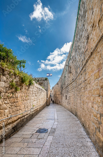 Morning in a narrow street of Hebrew residential quarter in old Jerusalem cit...