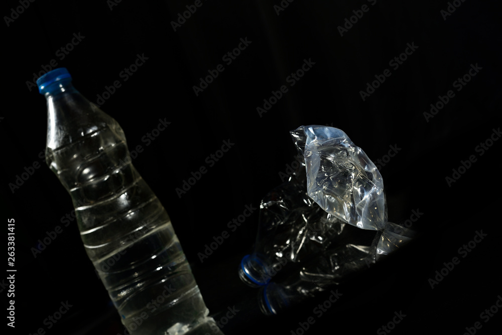 Plastic water bottle isolated on black background Plastic water bottle isolated on black background