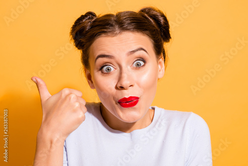 Close-up portrait of her she nice-looking attractive winsome lovable lovely cheerful cheery funny optimistic girl showing thumbup isolated over bright vivid shine yellow background