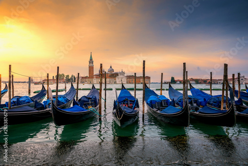 Sunrise landscape view of gondola and building in early morning with no people no tourist as beautiful amazing view and attraction in venice , Italy © martinhosmat083