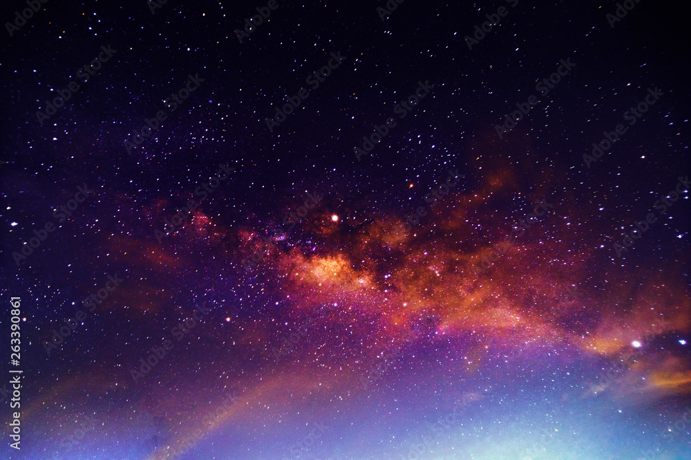 Night scenery with colorful and light yellow Milky Way Full of stars in the sky in summer Beautiful universe Background of space - obrazy, fototapety, plakaty 