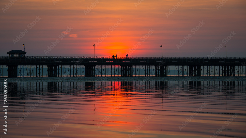 Isle of Wight serene sunset with pier detail
