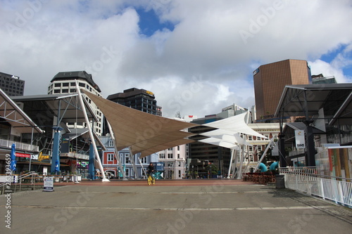 Man cycling under sails