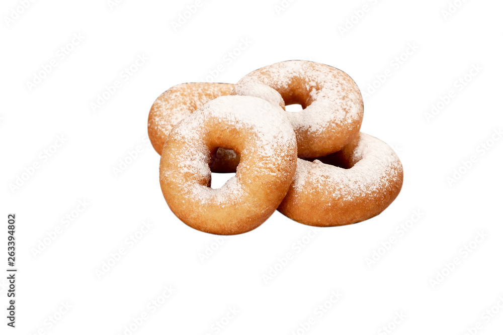 Juicy fresh donuts covered with powdered sugar on white isolated background Juicy fresh donuts covered with powdered sugar on white isolated background