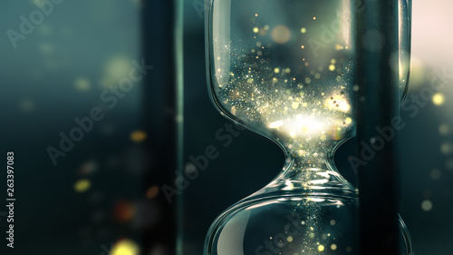 Quadro su tela hourglass close up with shining sand inside