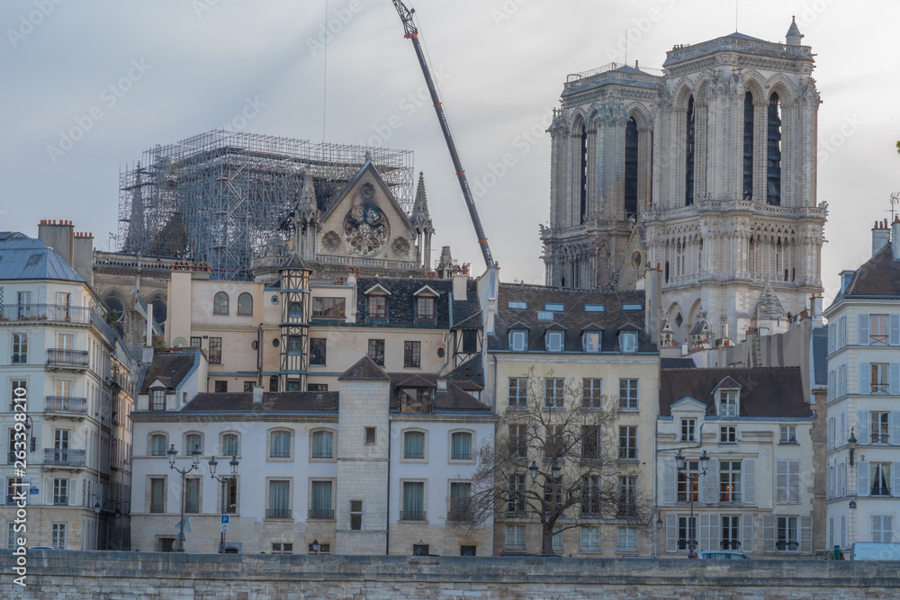Paris, France - 04 17 2019: The day after the fire at Notre-Dame Cathedral. View from the banks of the Seine