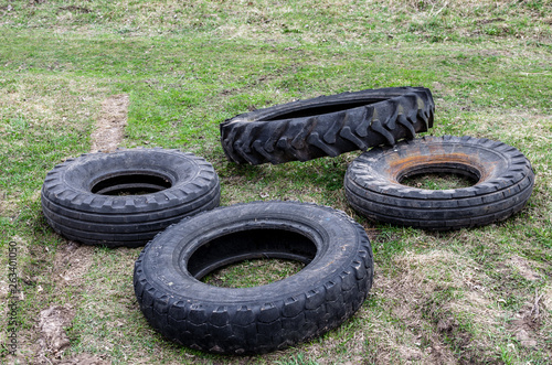 Tires from the tractor. Pollution of the environment with tractor spare parts