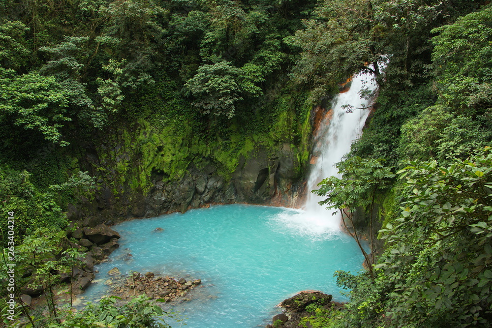 Waterfall on Rio Celeste in Parque Nacional Volcan Tenorio in Costa Rica Waterfall on Rio Celeste in Parque Nacional Volcan Tenorio in Costa Rica