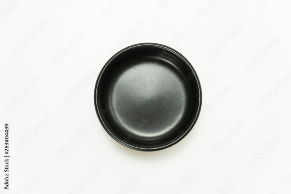 Top view of black circle ceramic bowl isolated on white background Top view of black circle ceramic bowl isolated on white background