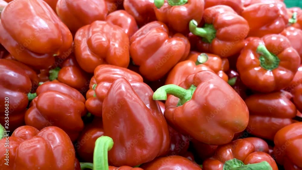 Fresh red pepper harvest close up on the market. Fresh red pepper harvest close up on the market.