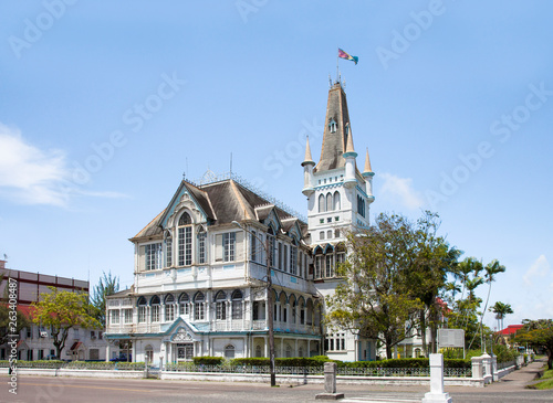 Ancient, fabulous building with a spire and towers, in the Gothic style. Georgetown. Guyana. photo