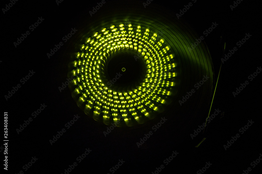 Concept of speed - Trail of fire and smoke - Vinyl record. Burning vinyl disk. Turntable vinyl record player. Retro audio equipment for disc jockey. Sound technology Concept of speed - Trail of fire and smoke - Vinyl record. Burning vinyl disk. Turntable vinyl record player. Retro audio equipment for disc jockey. Sound technology