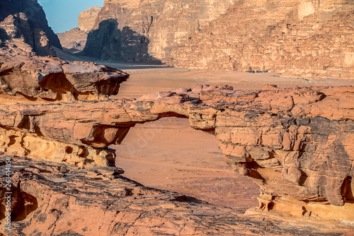 view on Little Bridge in incredible lunar landscape in Wadi Rum in the Jordanian desert with . Wadi Rum also known as The Valley of the Moon,  Jordan - Image