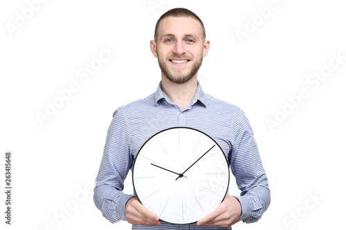 Portrait of young man with round clock on white hbackground photo