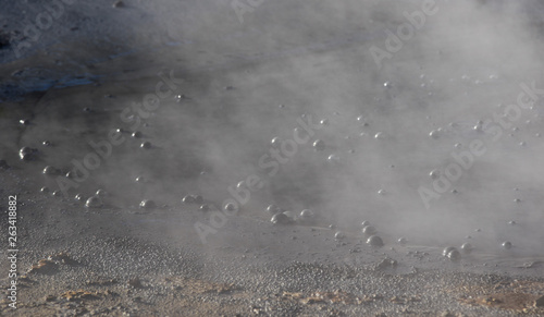Iceland geothermal zone Namafjall - area in field of Hverir. Landscape which pools of boiling mud and hot springs. Tourist and natural attractions.