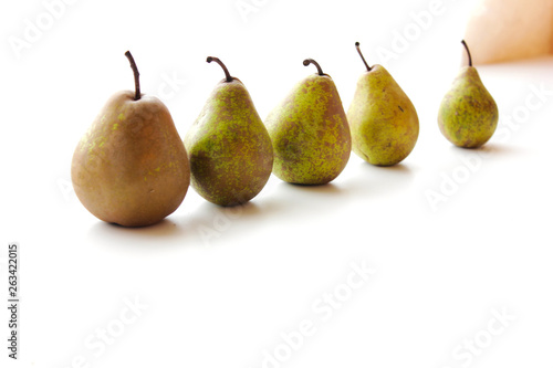 Green conference pears isolated on white background. With clipping path. Collection.