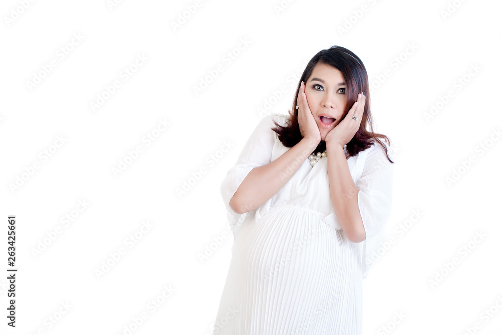 Surprised pregnant woman in white dress Surprised pregnant woman in white dress