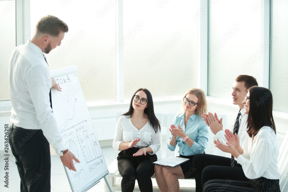 group of businesspeople clapping hands during meeting presentation group of businesspeople clapping hands during meeting presentation