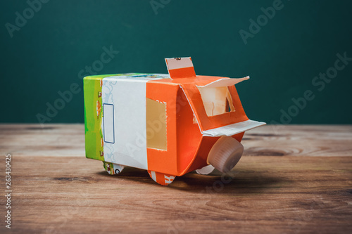 Obraz na płótnie DIY paper milk bag. Creative paper milk bag ideas. Recycle crafts. w salonie