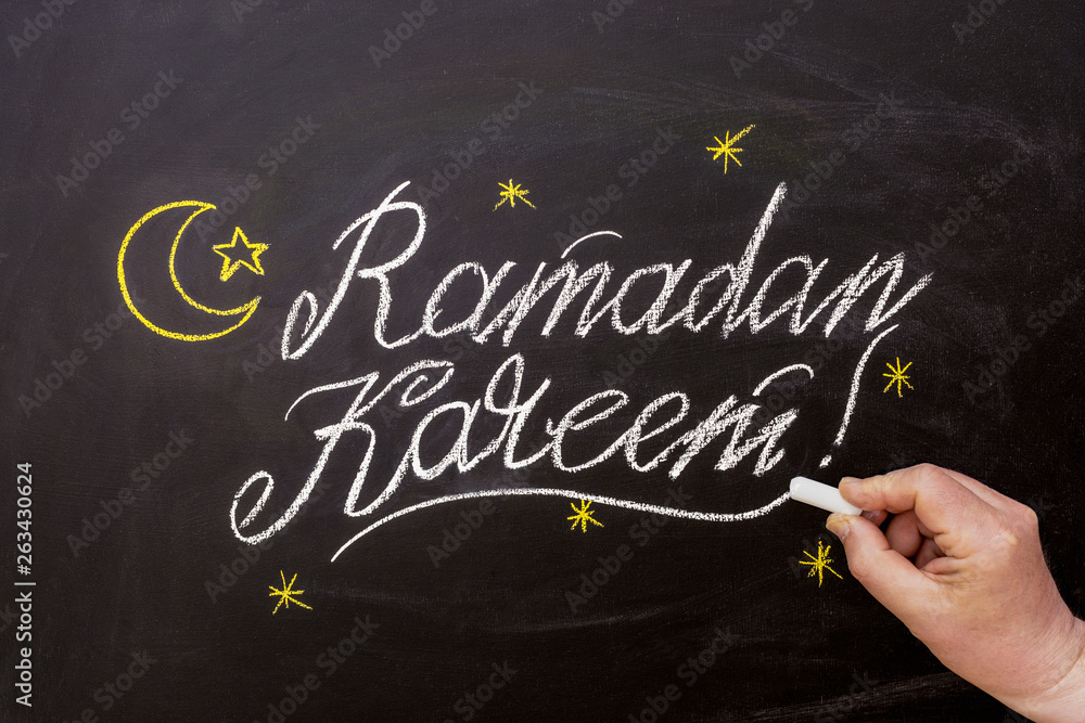 Beautiful Ramadan Kareem text on chalkboard Beautiful Ramadan Kareem text on chalkboard