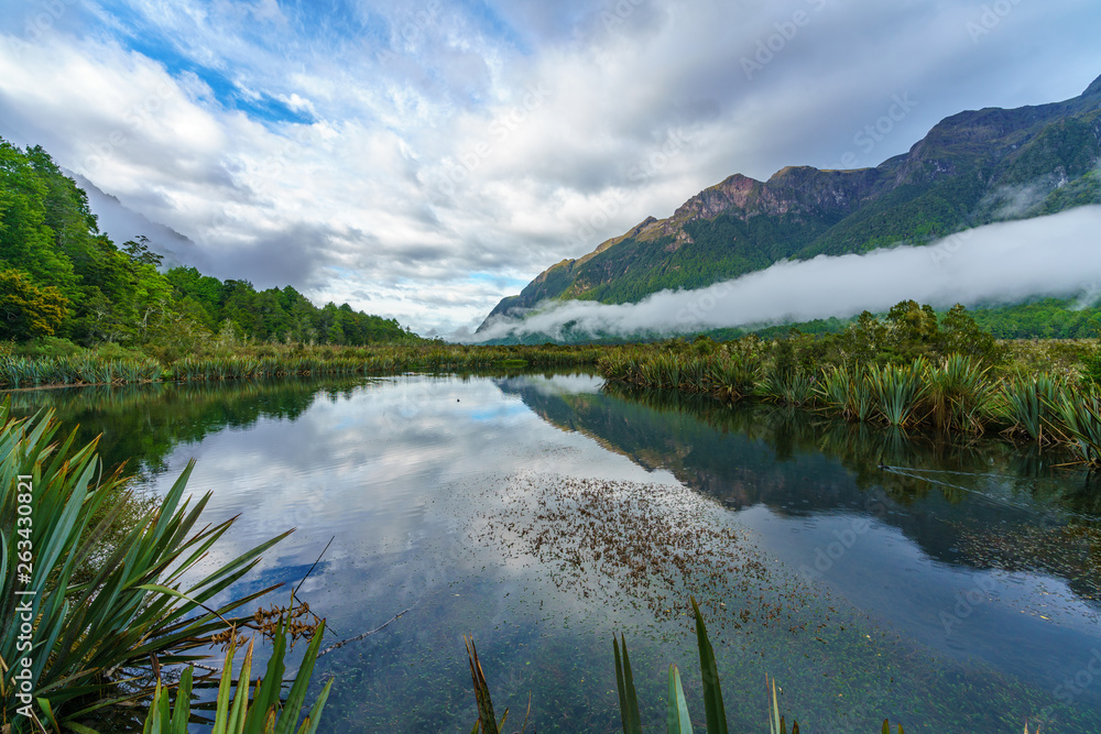 reflections of mountains in the mirror lakes, new zealand 16