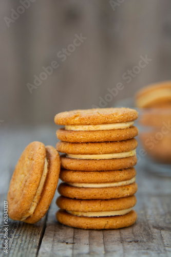 Sandwich, ginger healthy biscuits with cream , close up, isolated. Cookies for tea or snack.