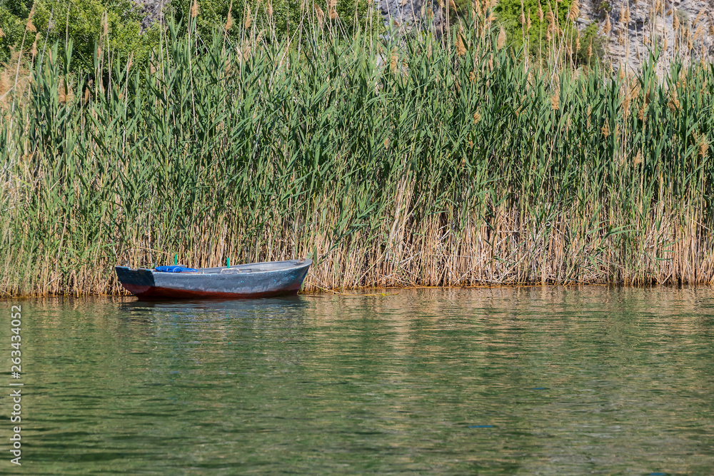 Dalyan River with tourist boats in the straits of the river 