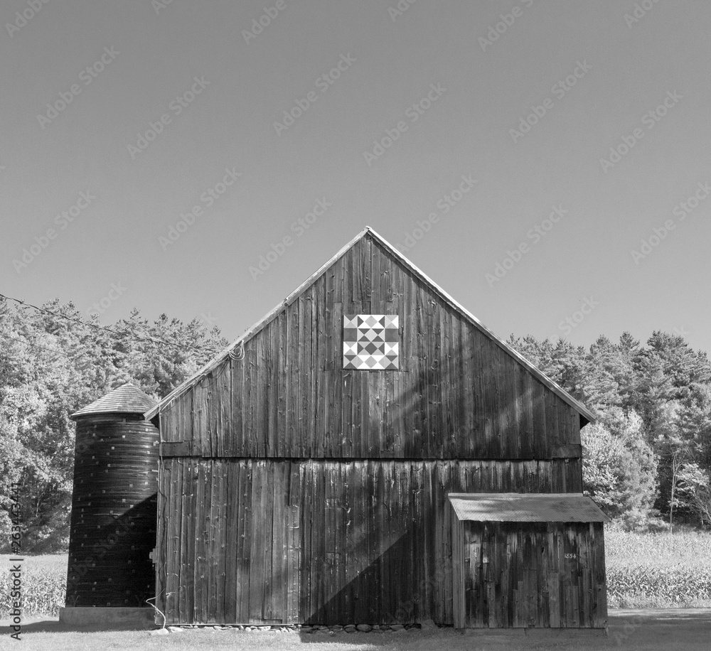 barn with quilt and wooden silo black and white barn with quilt and wooden silo black and white