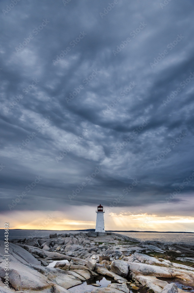 nova scotia lighthouse with storm clouds