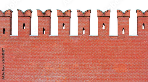 Close up view on a fragment of red brick wall with a dovetail-shaped merlon (battlement), isolated on a white background