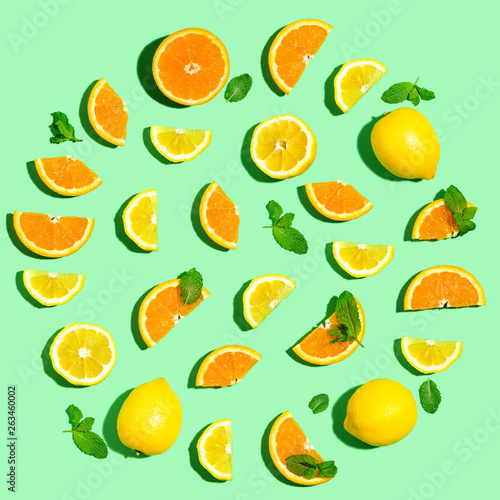 Fototapeta Naklejka Na Ścianę i Meble -  Collection of oranges and lemons overhead view flat lay