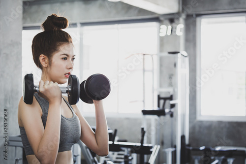 Fitness woman doing exercise in gym